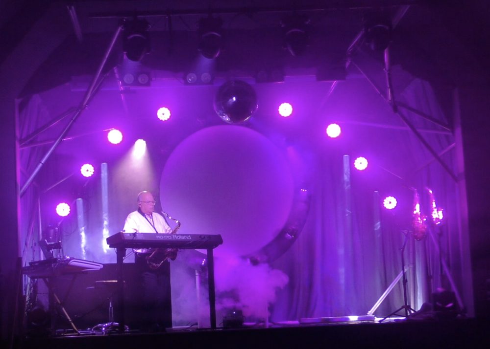 Us and Them — Phil on piano and saxophone